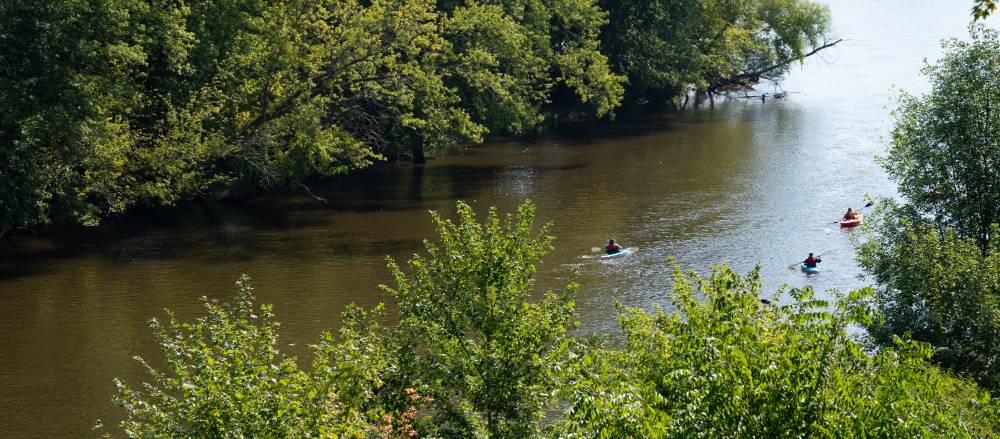 Wide shot of kayak on the river